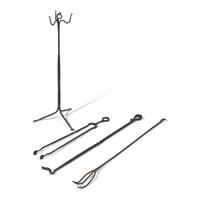 A Group of Four Arts and Crafts Wrought Iron Fireplace Tools