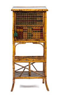 A Victorian Lacquered Bamboo and False Book Fronted Cabinet on Stand, Height 46 x width 20 3/4 x depth 14 3/4 inches.