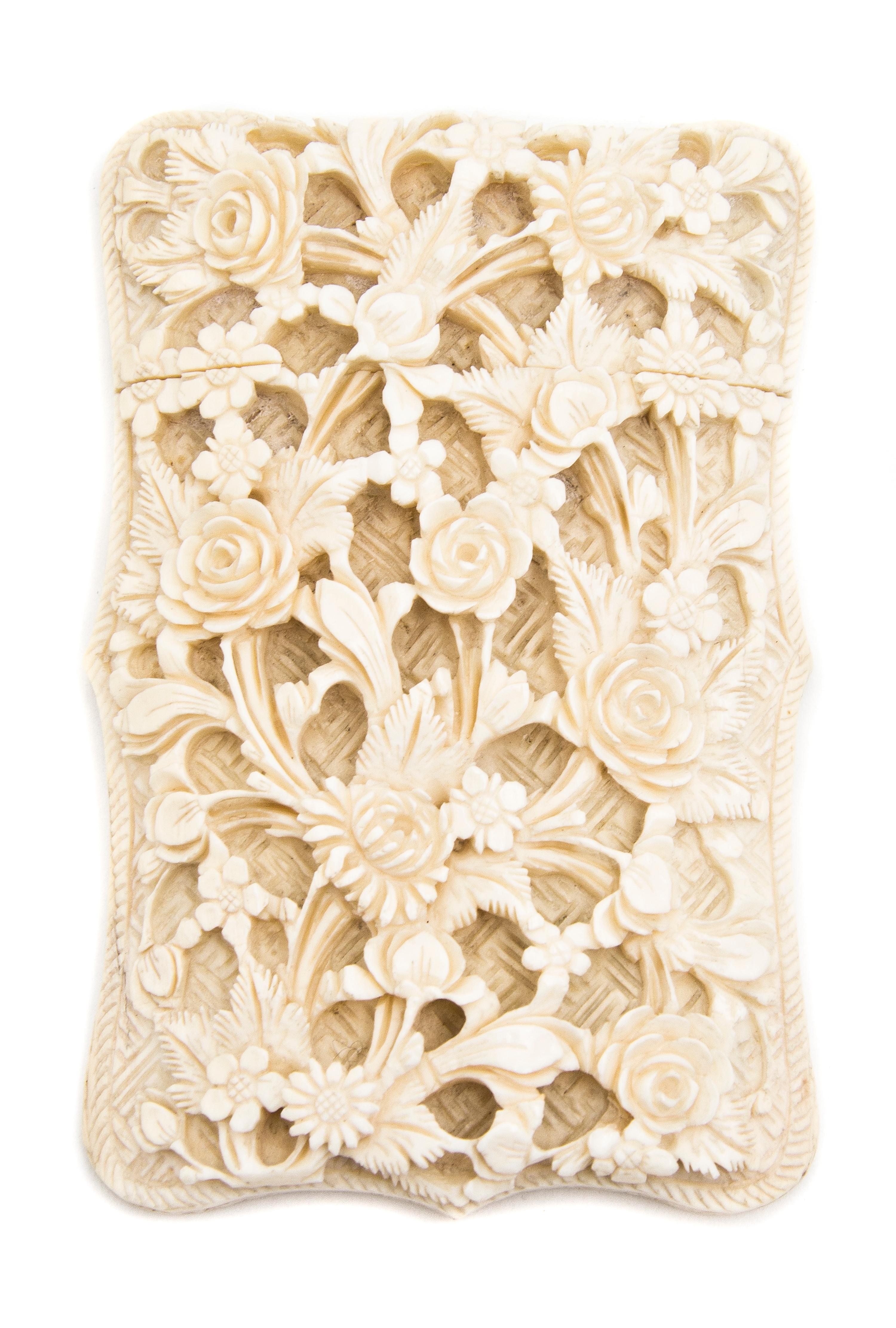 A Chinese Carved Ivory Card Case, Height 4 1/8 inches.
