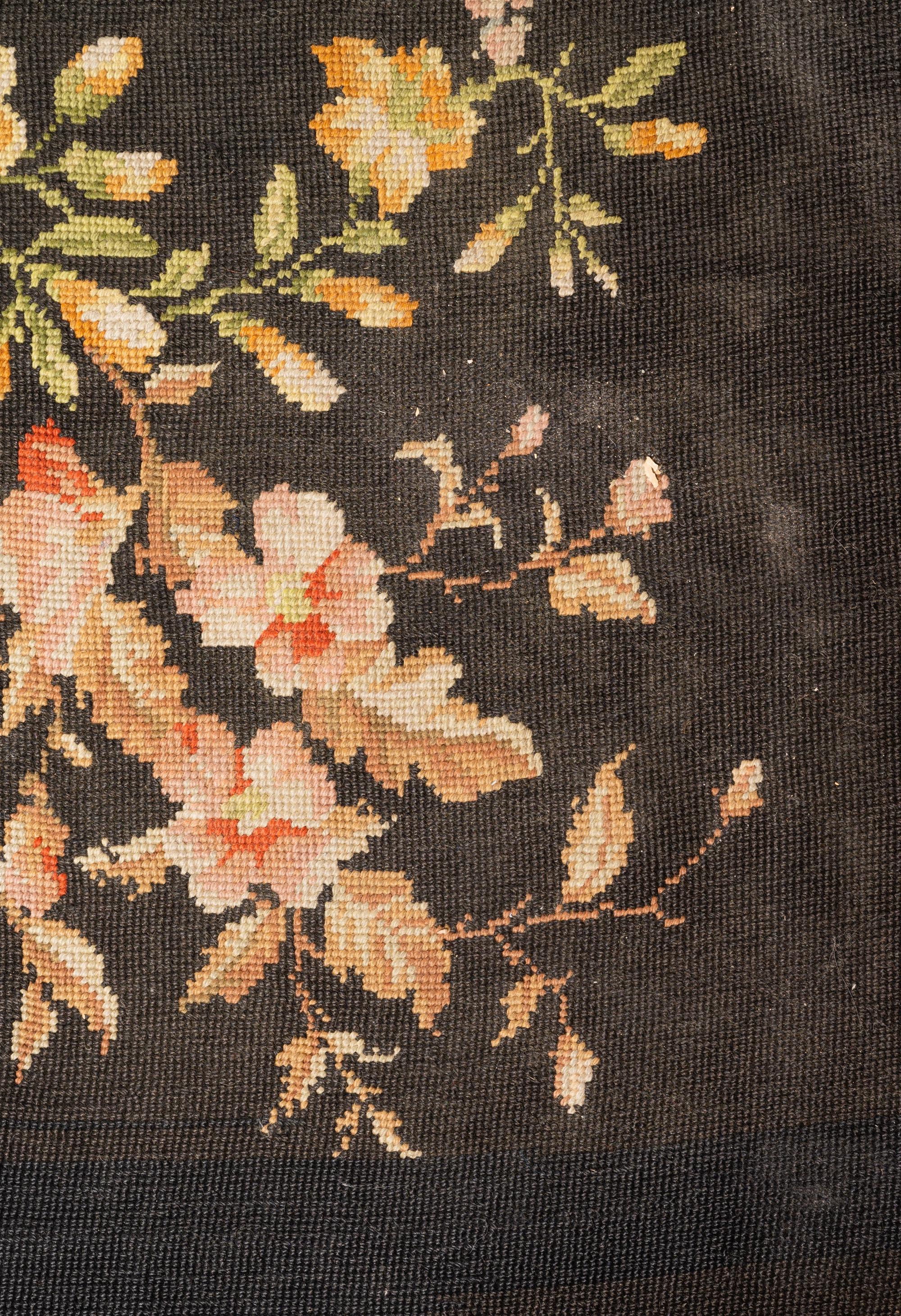 A Floral Needlepoint Rug