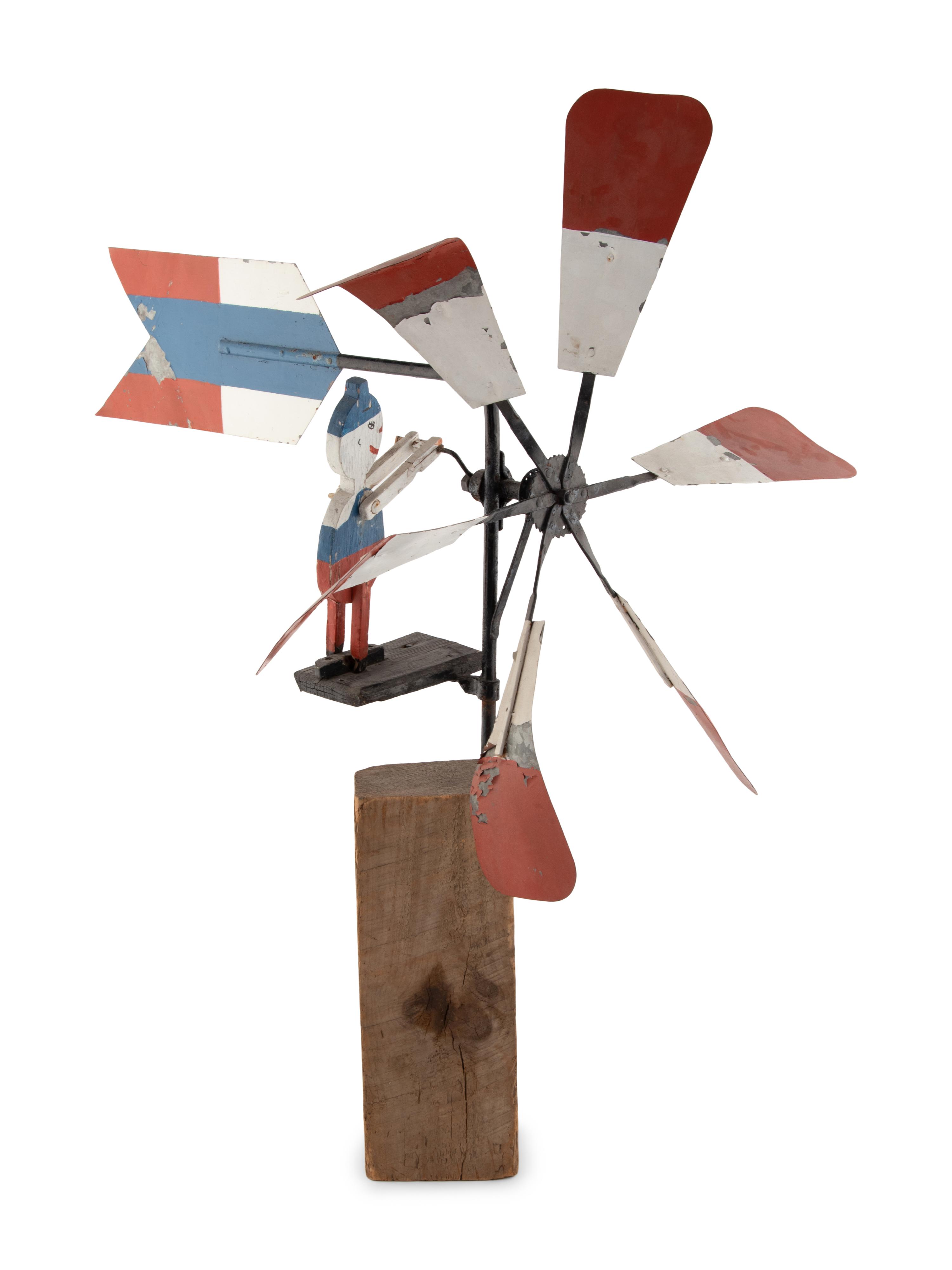 A Painted Wood and Metal Patriotic Figural Whirligig