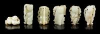 Six Celadon Jade Figures Height of tallest 2 inches.