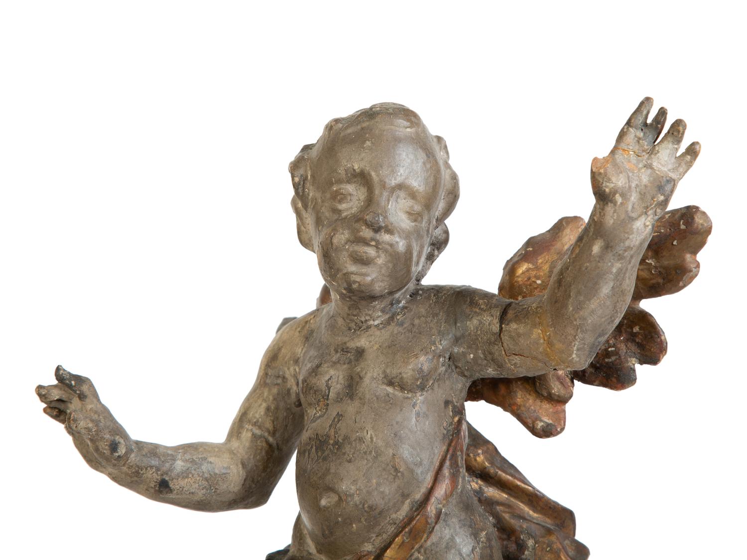 A Pair of Italian Carved Putti on Painted Faux-Marble Bases — 17TH/18TH CENTURY