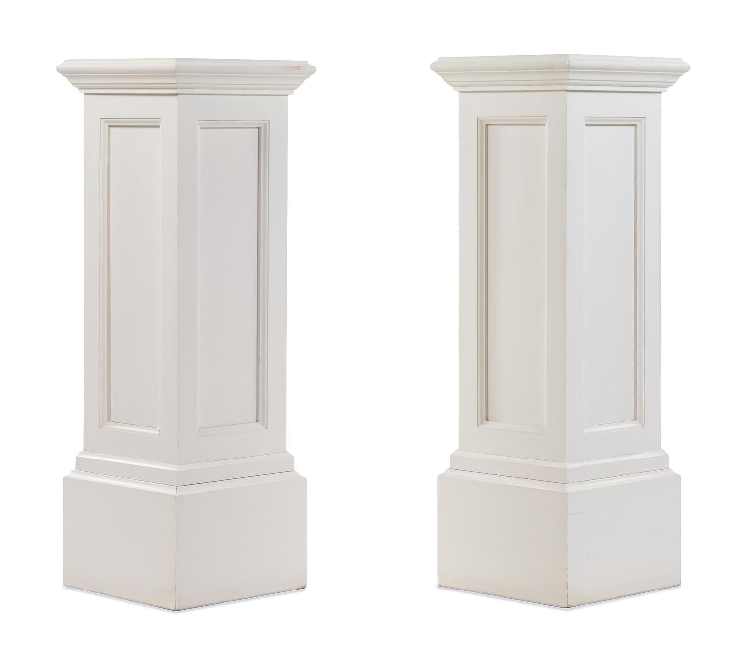 A Pair of White Painted Pedestals Height 39 1/4 x width 13 3/4 x depth 13 3/4 inches. — 20TH CENTURY
