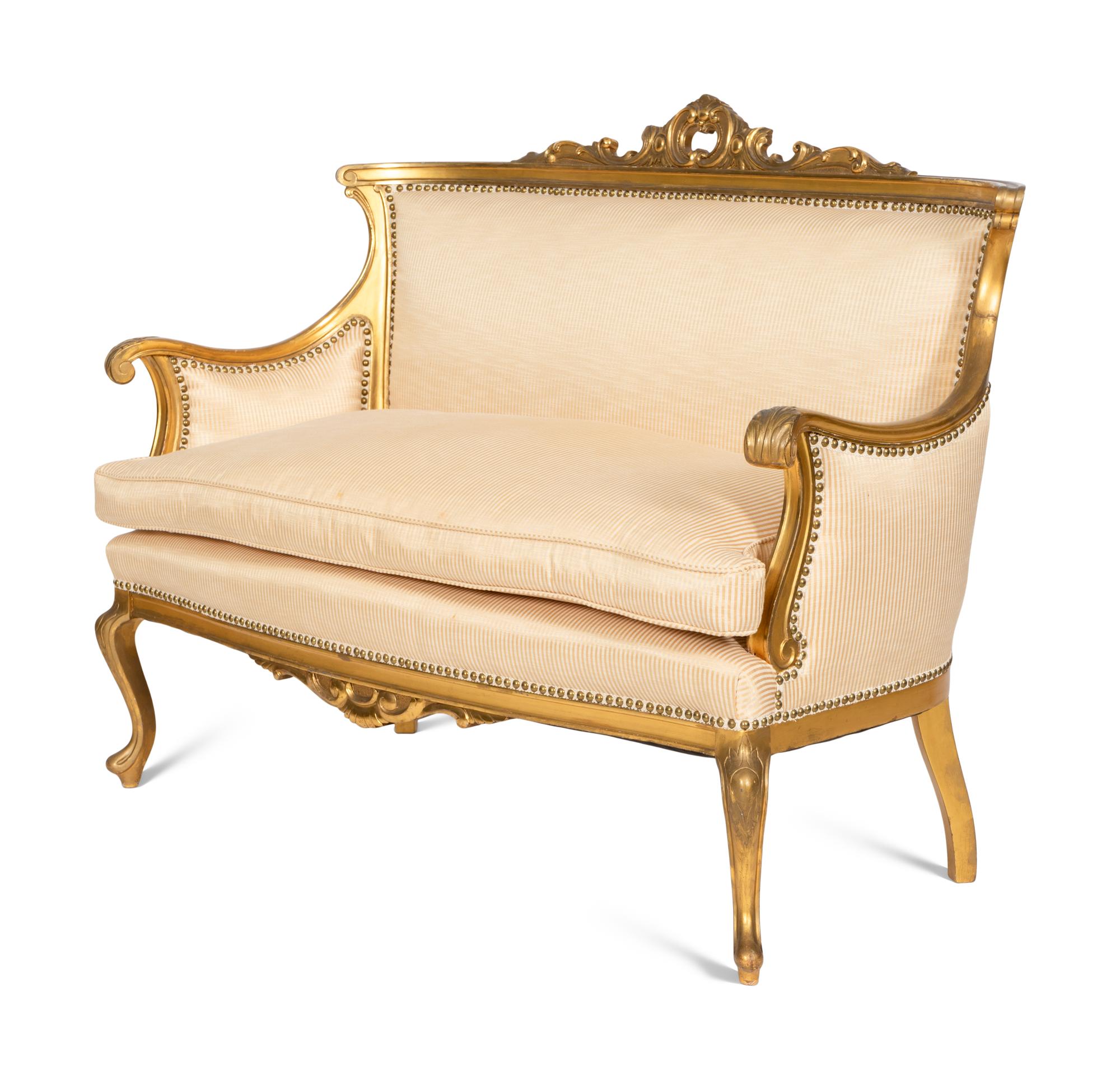 A Victorian Louis XV Style Giltwood Three-Piece Parlor Suite