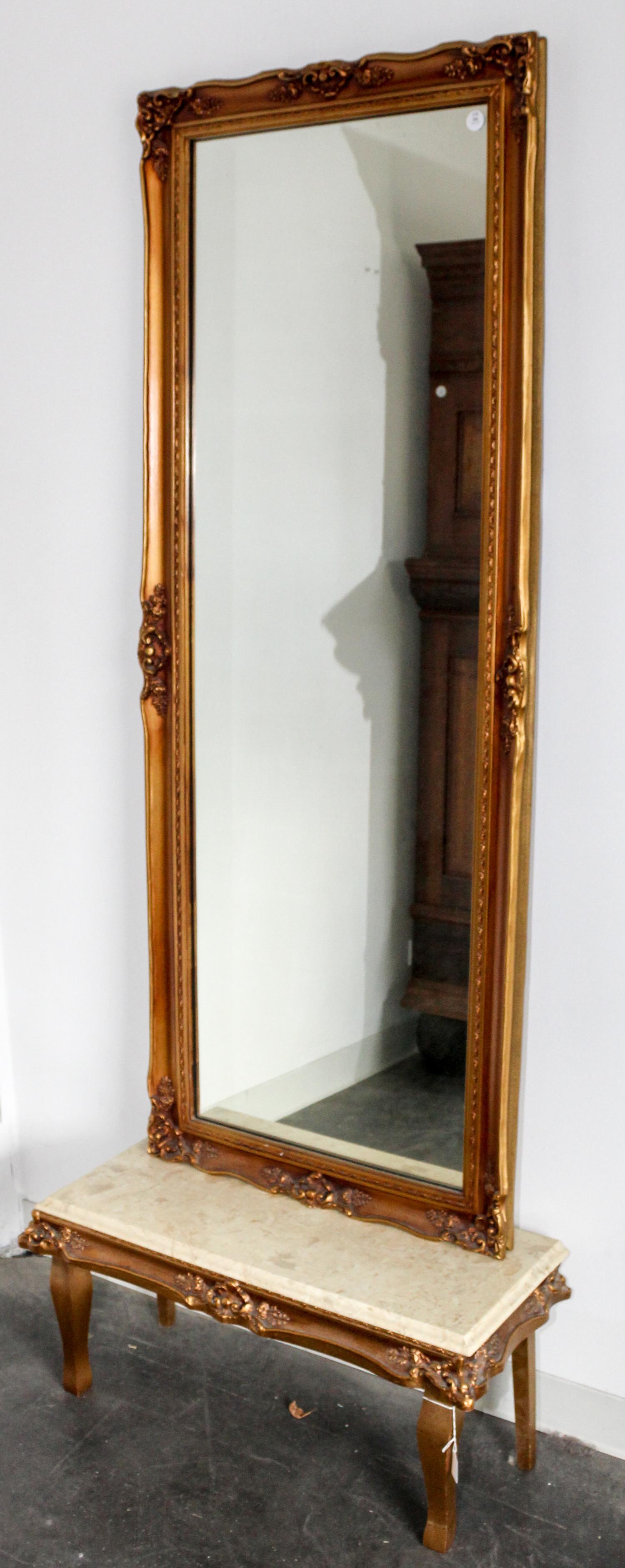 A Victorian Style Giltwood Pier Mirror. Height of mirror 65 inches.
