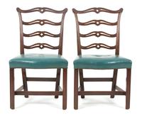 A Pair of Chippendale Style Carved Mahogany Ladder Back Side Chairs Height 37 1/2 inches. — EARLY 20TH CENTURY