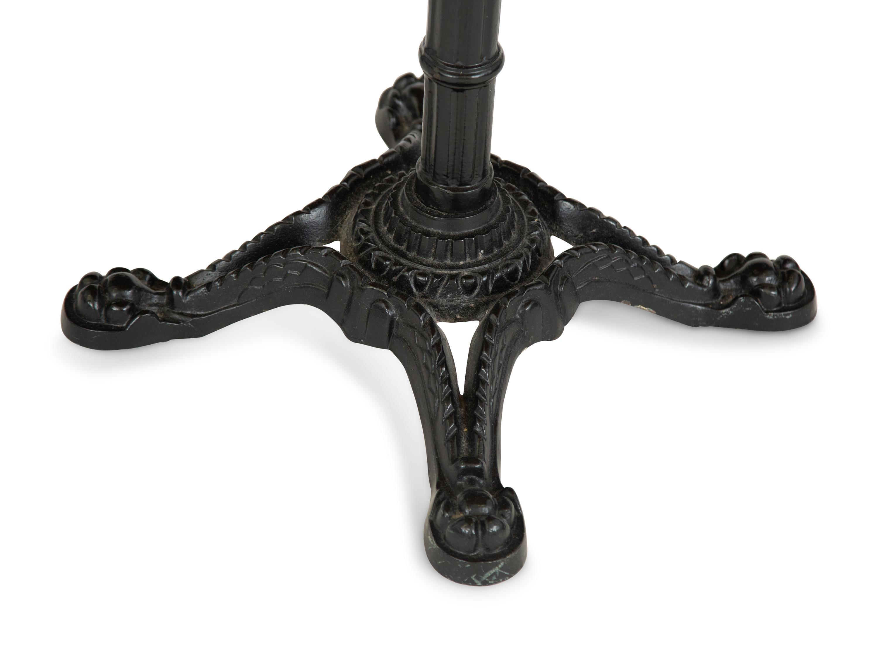 A Victorian Bistro Table with Iron Base and Cherry Top