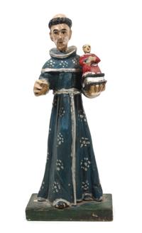 A New Mexican Carved and Painted Wood Bulto Height 13 1/2 inches.