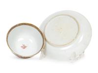 A Chinese Export Porcelain Famille Rose Cup and Saucer