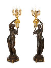 A Pair of French Gilt and Patinated Bronze Figural Nine-Light Torchères