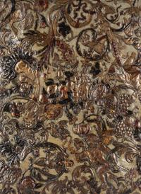 A Continental Tooled and Painted Leather Panel