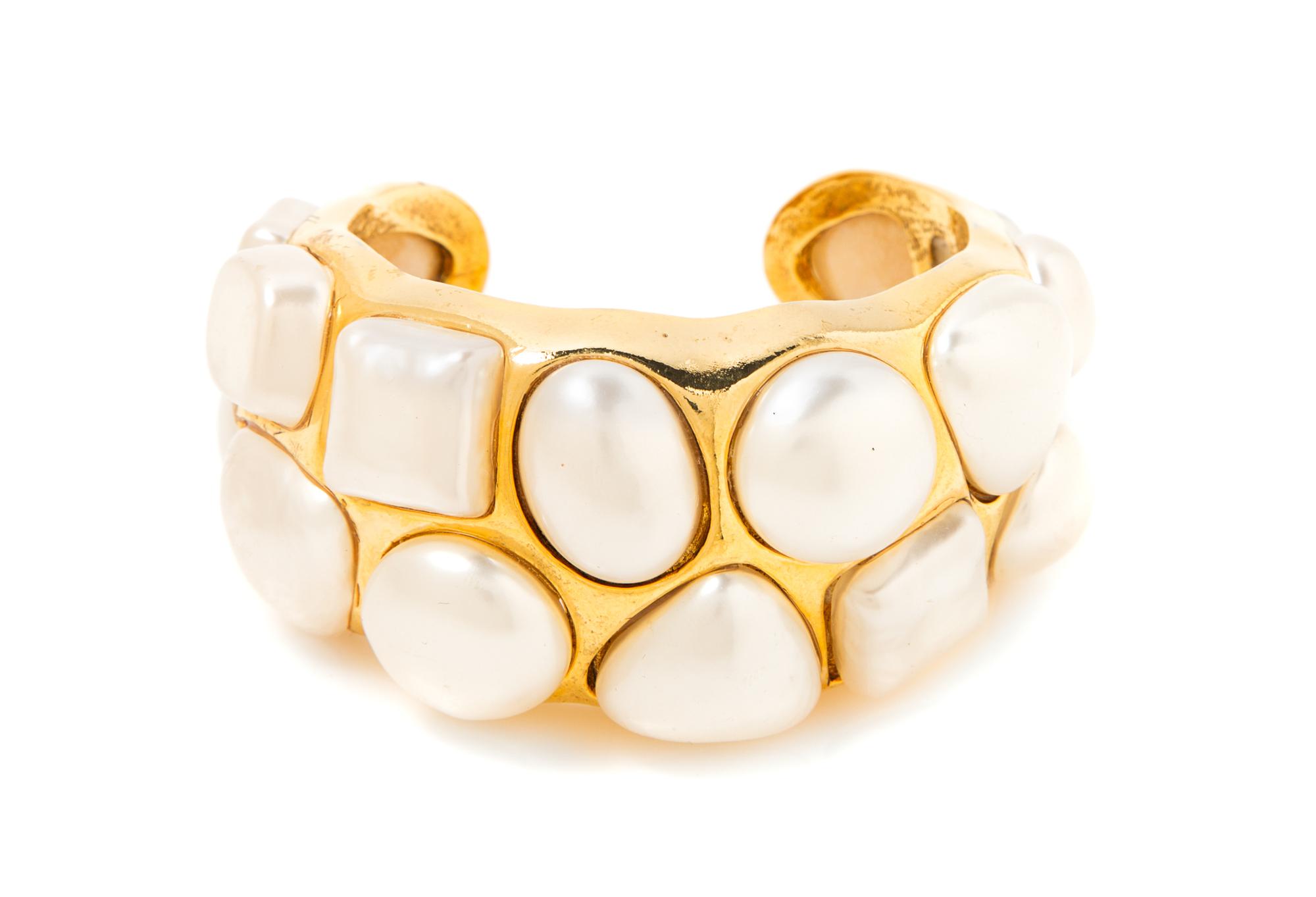 A Chanel Goldtone and Faux Pearl Cuff, 6.5" circumference; 2" width.