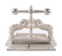A Dolphin Form Silvered Metal Book Press