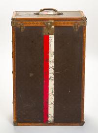 A Louis Vuitton Monogram Leather Wardrobe Trunk, 33.5"H x 21.25"W x 9"D.