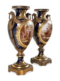A Pair of Large Gilt Bronze Mounted Sèvres Style Porcelain Urns