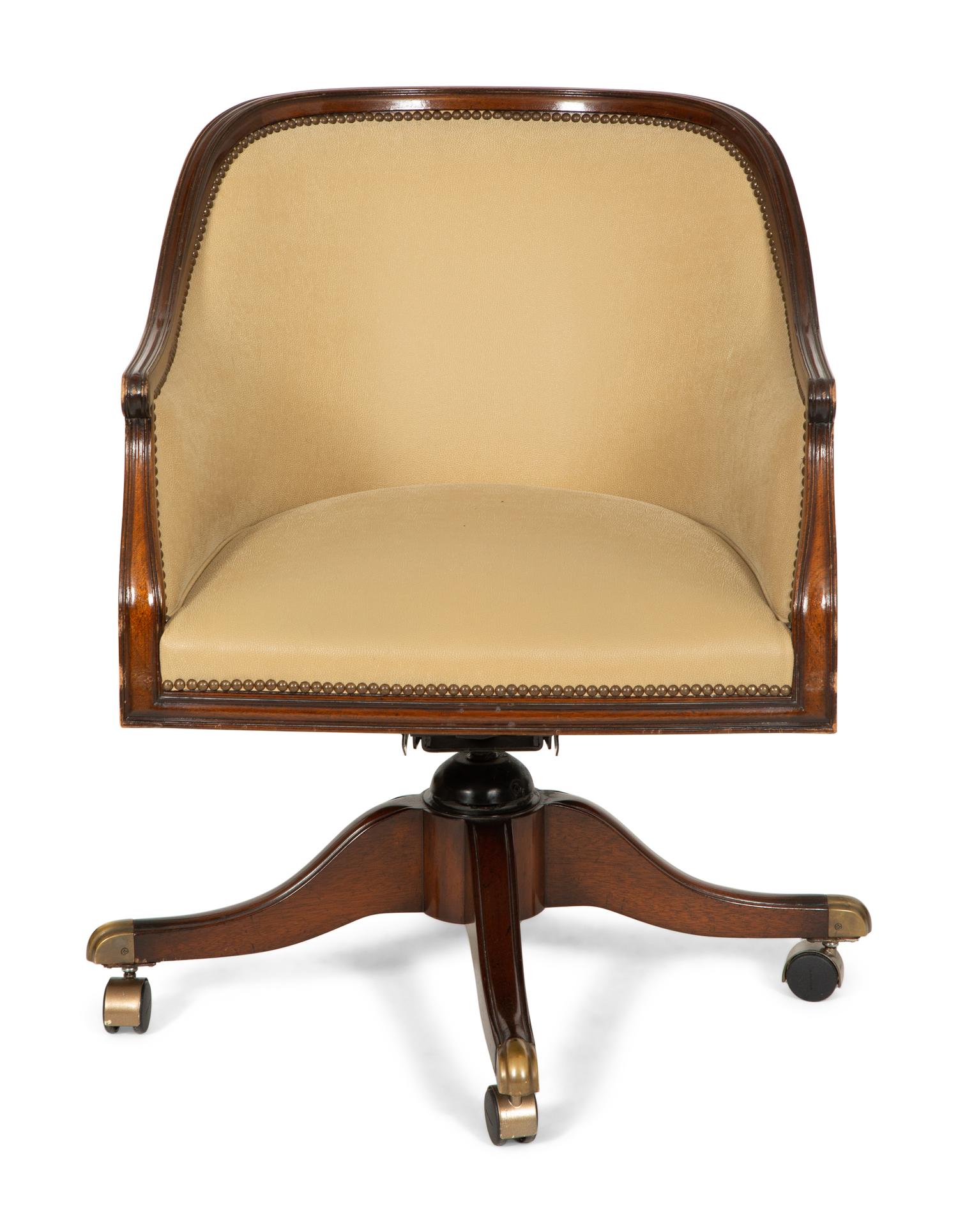 A Regency Style Mahogany Barrell Back Swivel Desk Chair