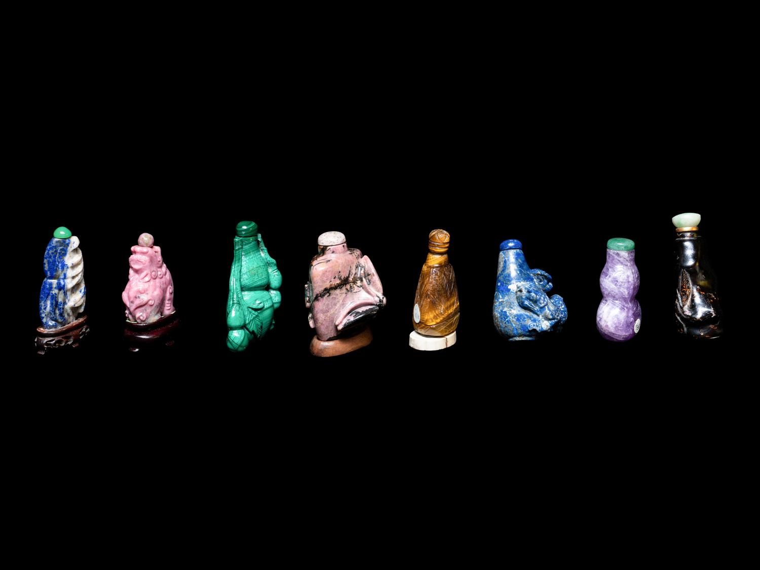 Eight Chinese Precious Stone and Lacquered Snuff Bottles