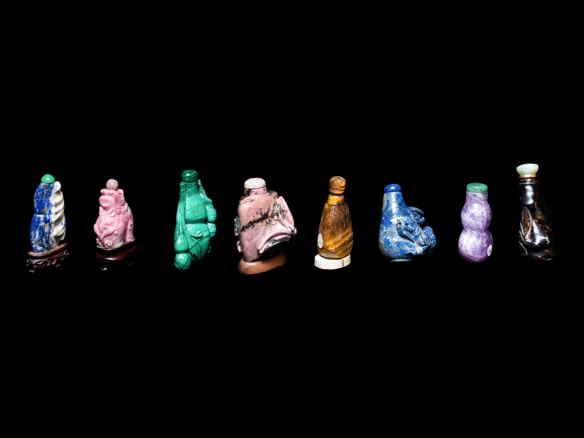 Eight Chinese Precious Stone and Lacquered Snuff Bottles