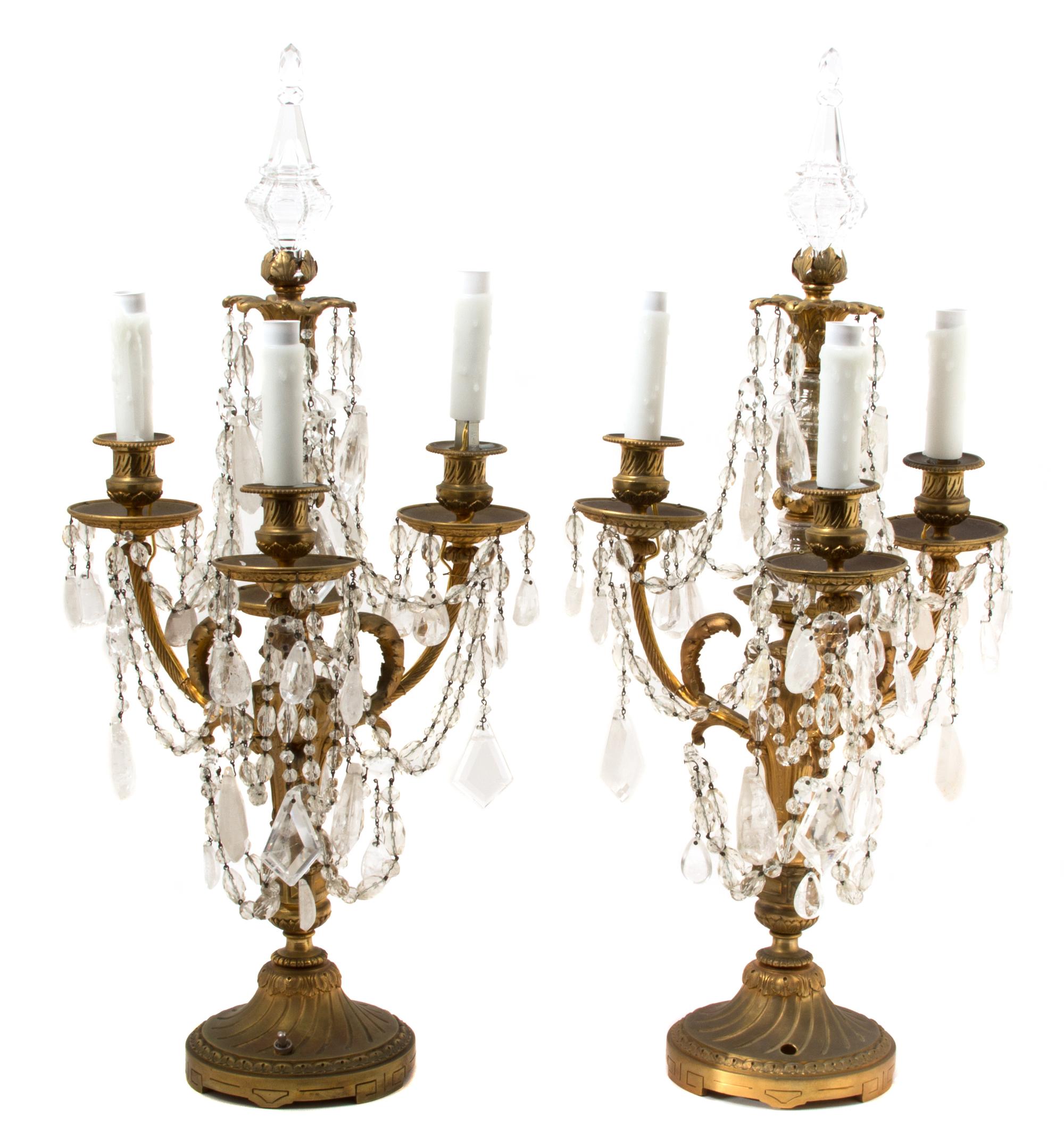 A Pair of Louis XVI Style Three-Light Gilt Bronze and Cut Crystal Candelabra Height 27 1/2 x diameter 13 inches. — 19TH CENTURY