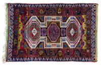 A Caucasian Wool Rug 4 feet 5 inches x 3 feet.