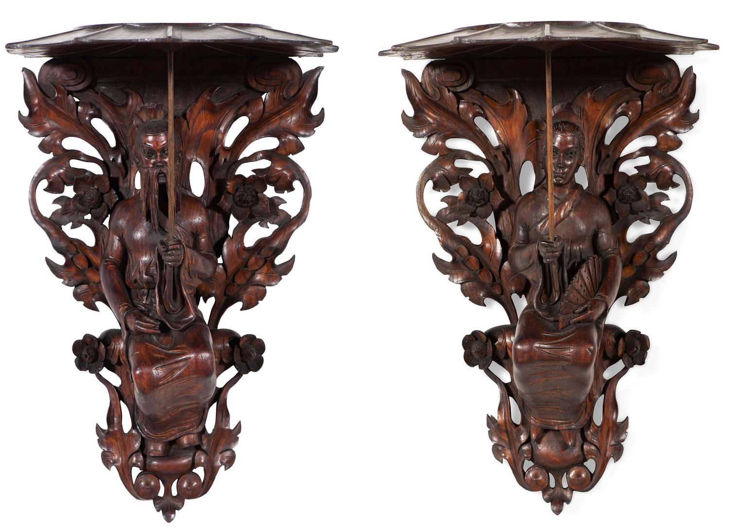 A Pair of Carved Oak Figural Wall Brackets