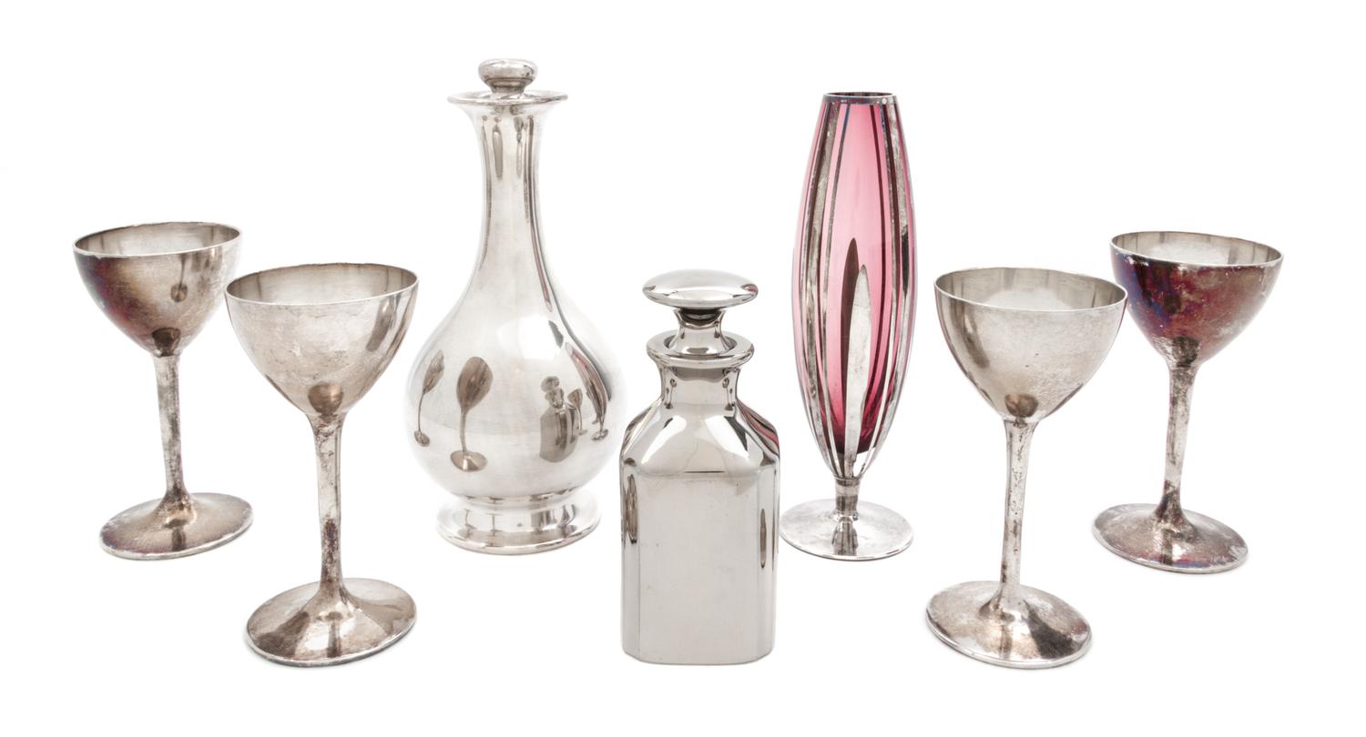A Group of Seven Silver Overlay Cocktail Articles Height of tallest 8 1/2 inches.