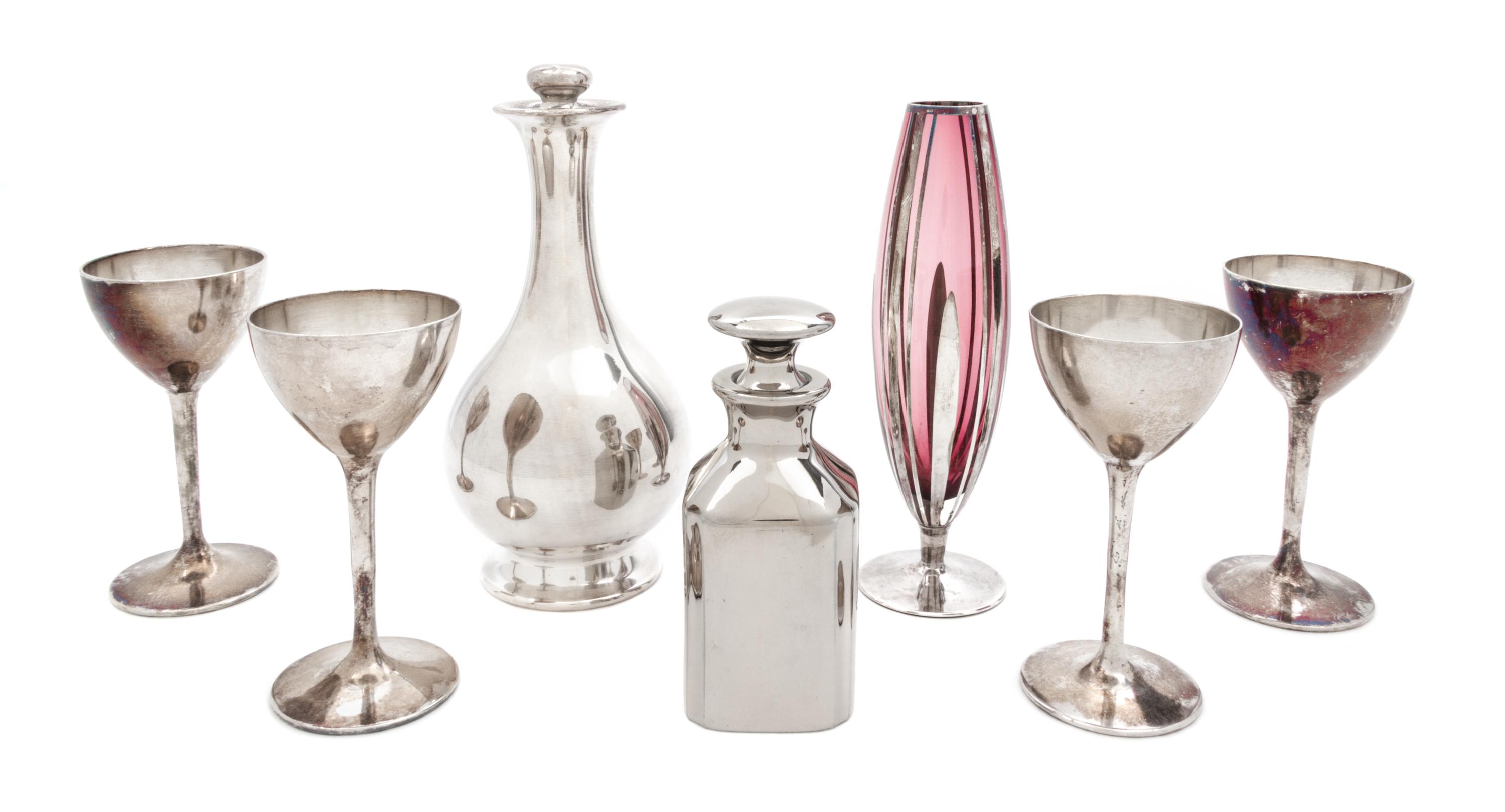 A Group of Seven Silver Overlay Cocktail Articles Height of tallest 8 1/2 inches.