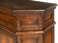 An Italian Baroque Carved Walnut Cabinet