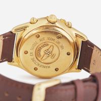 An 18K Yellow Gold Breitling Chronograph Cockpit K30012