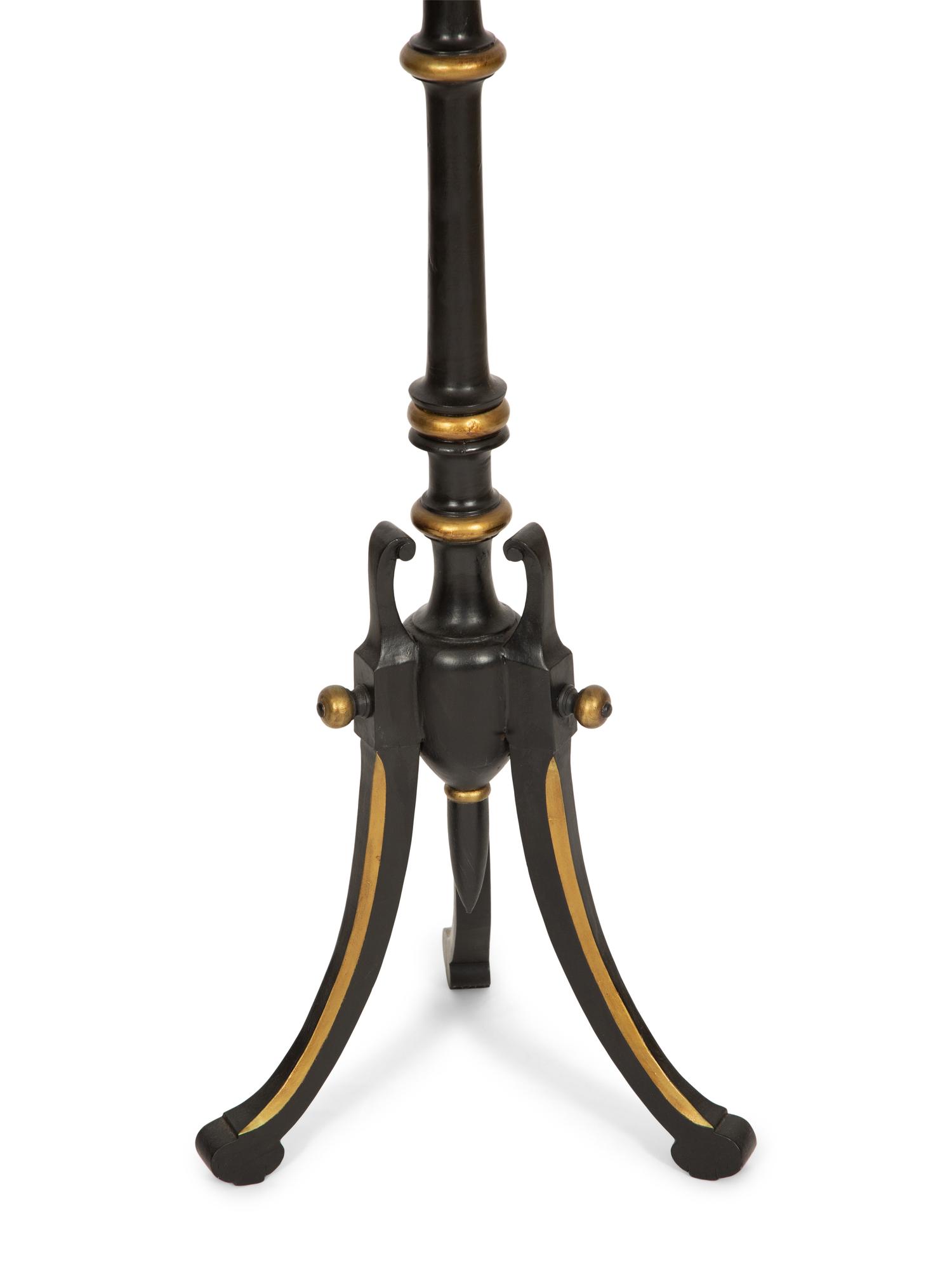 A Pair of Regency Style Painted and Parcel Gilt Tripod Stands