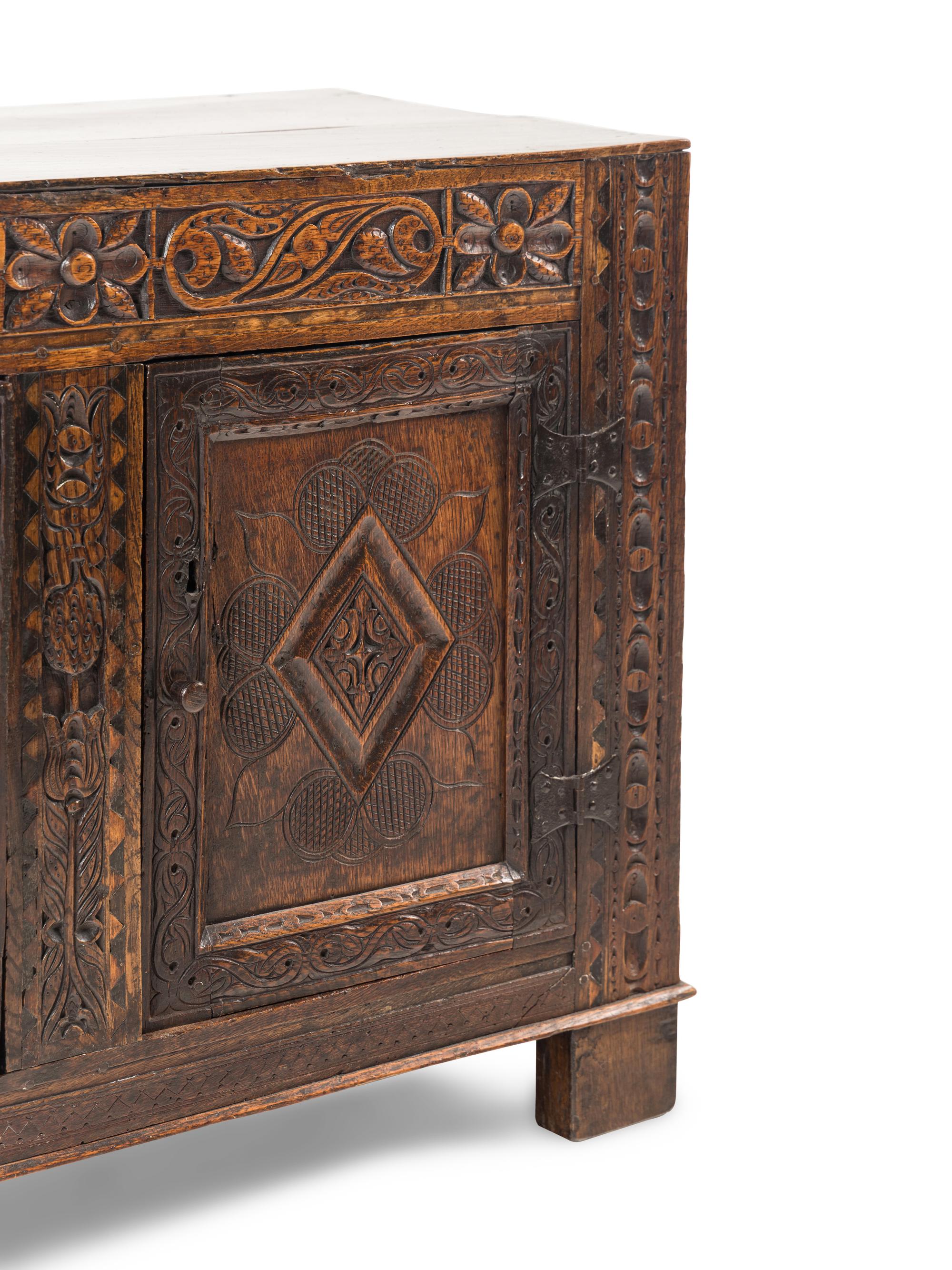 A Welsh Carved Oak Side Cabinet
