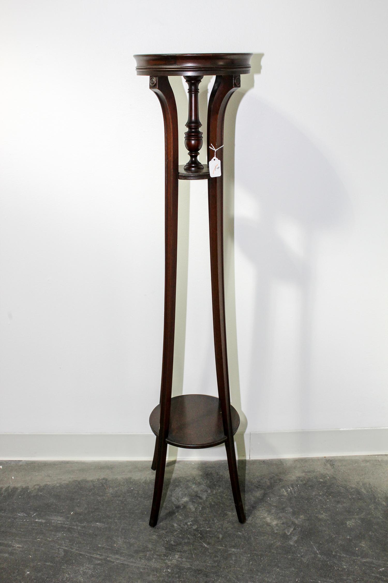 A Regency Style Mahogany Pedestal Height 48 x diameter 10 3/4 inches. — 20TH CENTURY