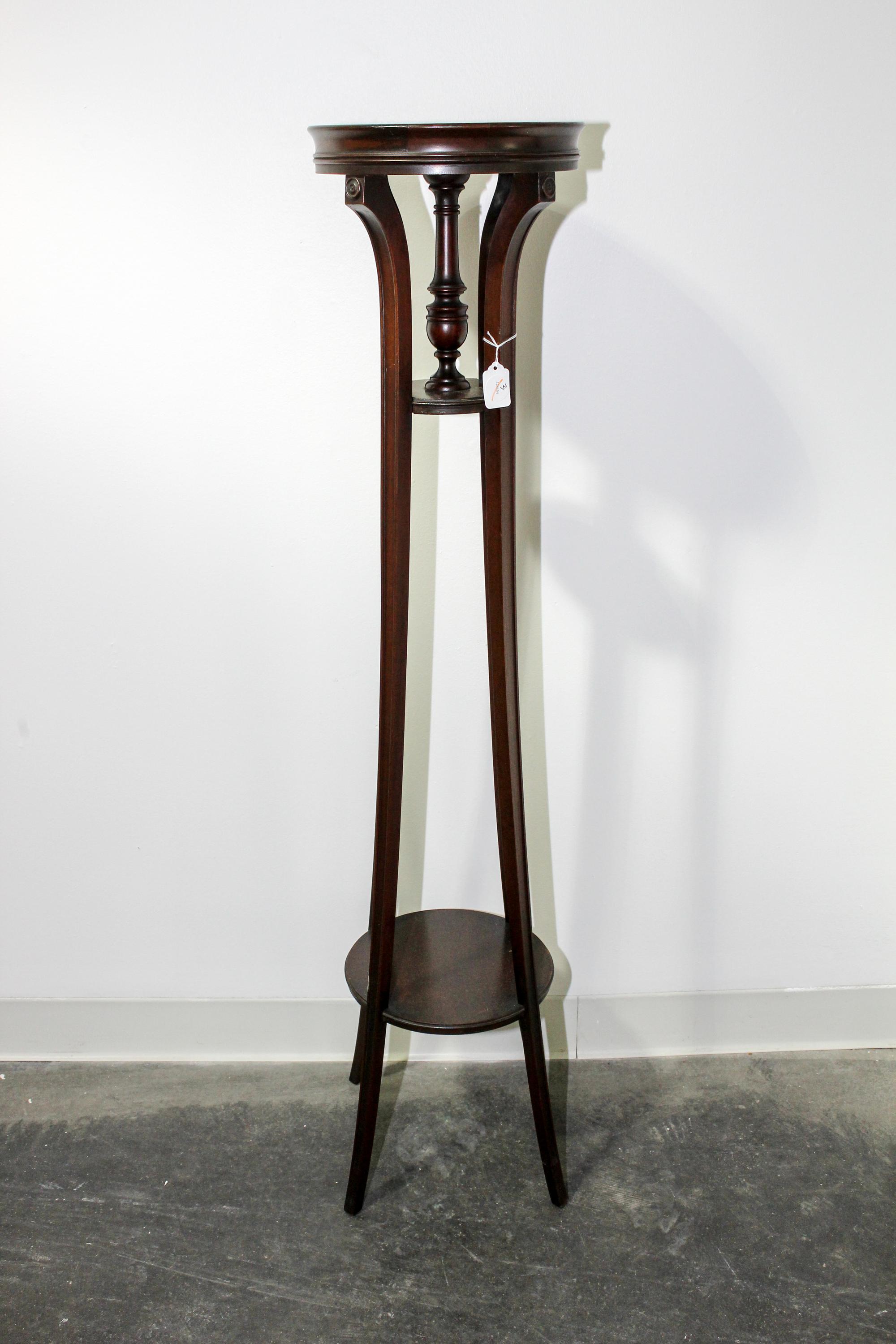 A Regency Style Mahogany Pedestal Height 48 x diameter 10 3/4 inches. — 20TH CENTURY