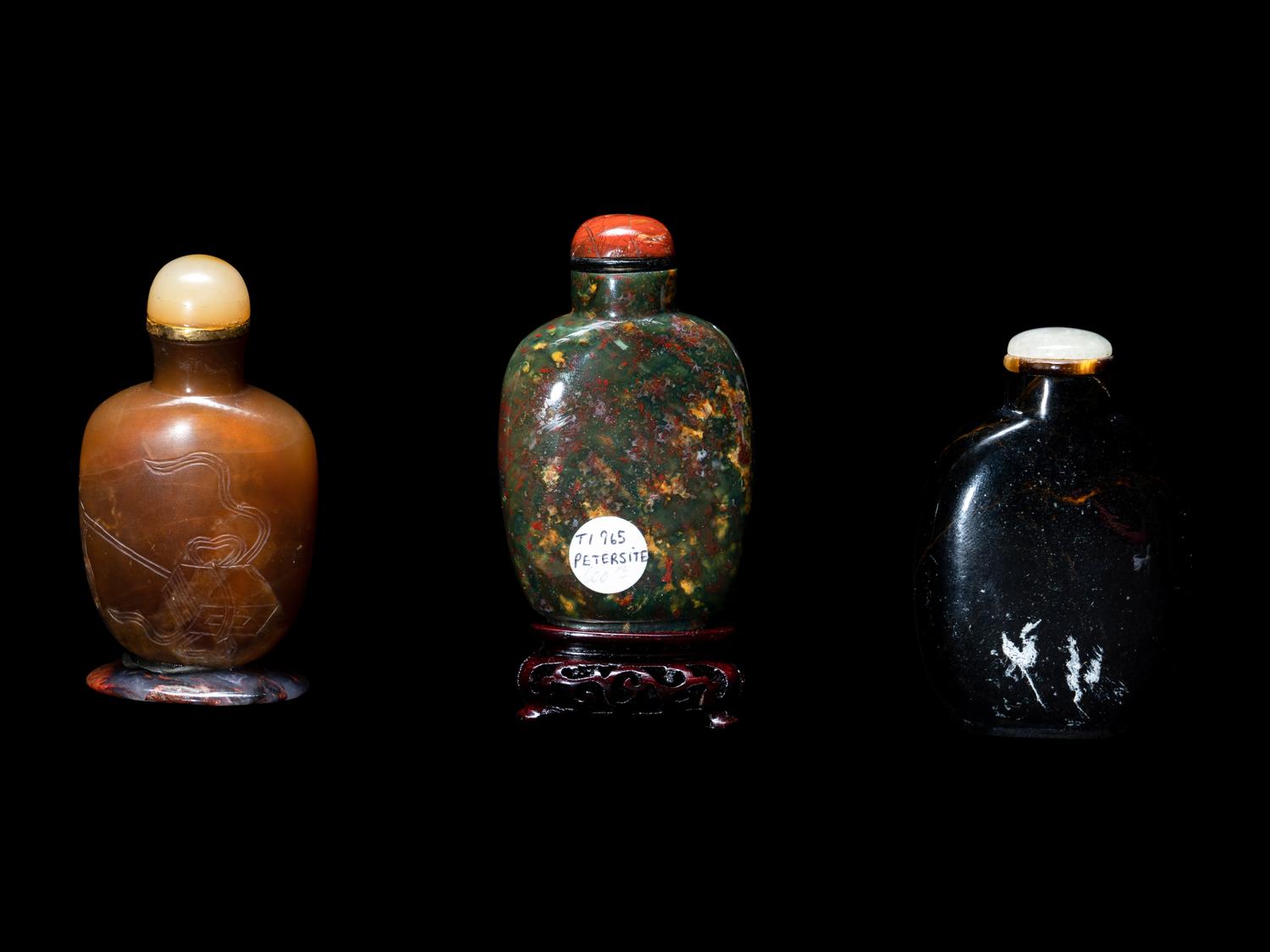 Three Chinese Carved Hardstone Snuff Bottles