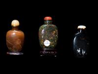 Three Chinese Carved Hardstone Snuff Bottles