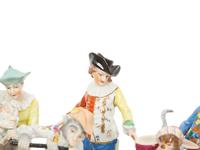 A Large Group of Meissen and Dresden Porcelain Figures