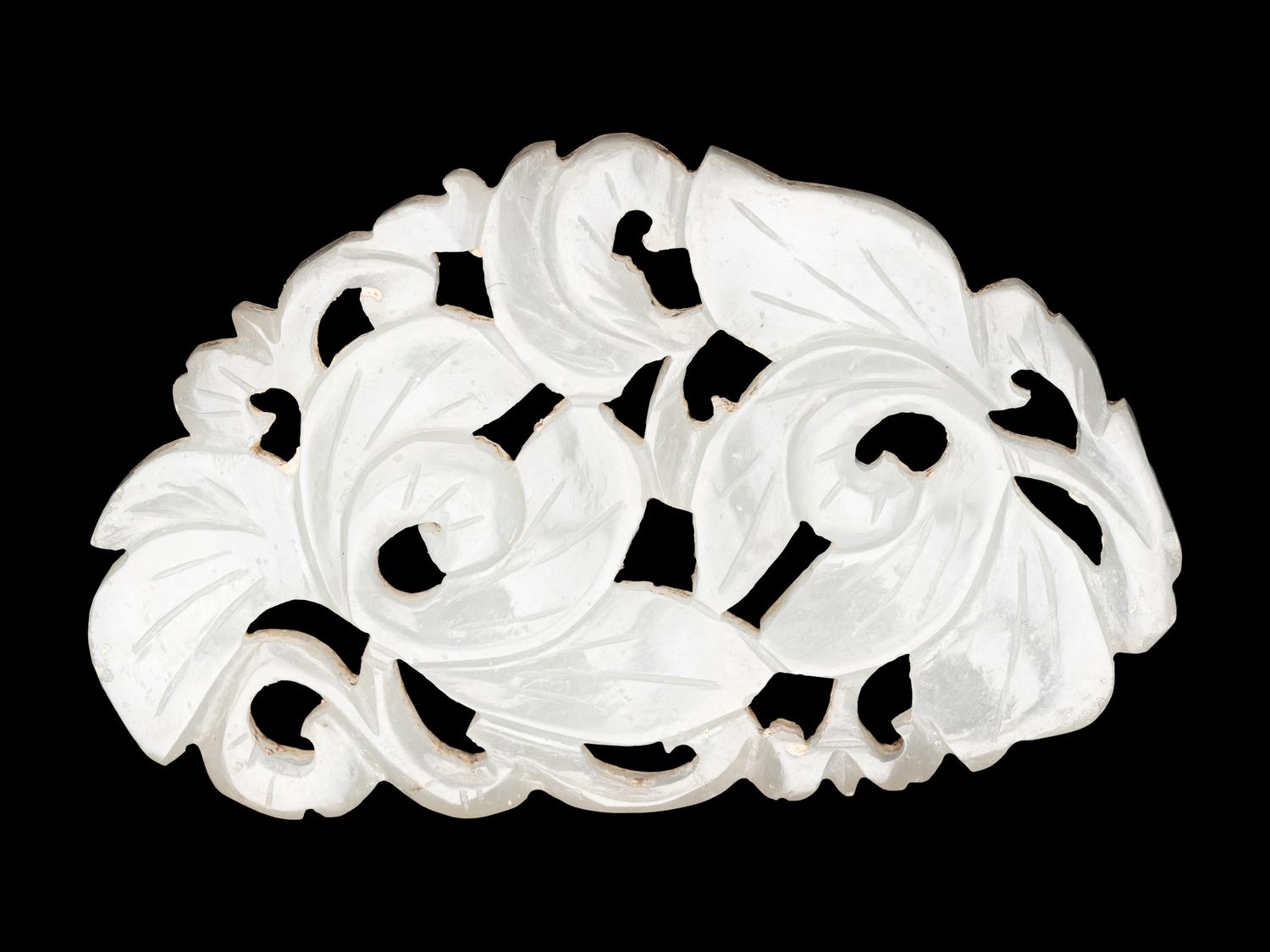 Three Chinese Pale Celadon Jade Reticulated Flori-Form Pendants