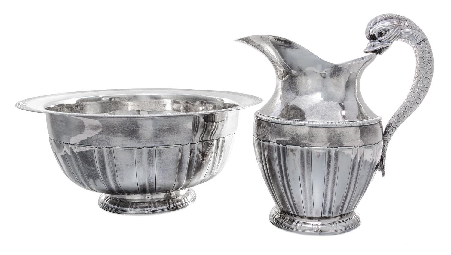 A Portuguese Silver Ewer and Basin, Maria da Gloria, Porto, Circa 1853, the ewer with a dolphin handle, the bowl with a ribbed edge.
