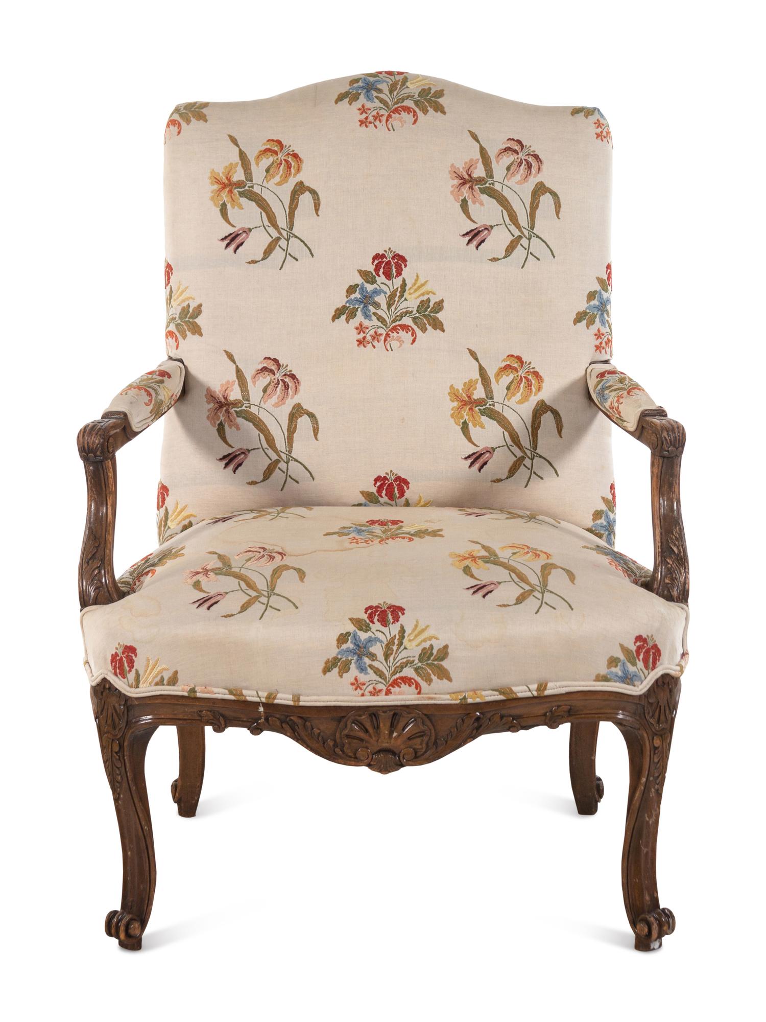 A Régence Style Carved Walnut Armchair