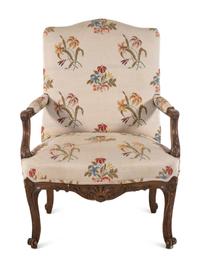 A Régence Style Carved Walnut Armchair
