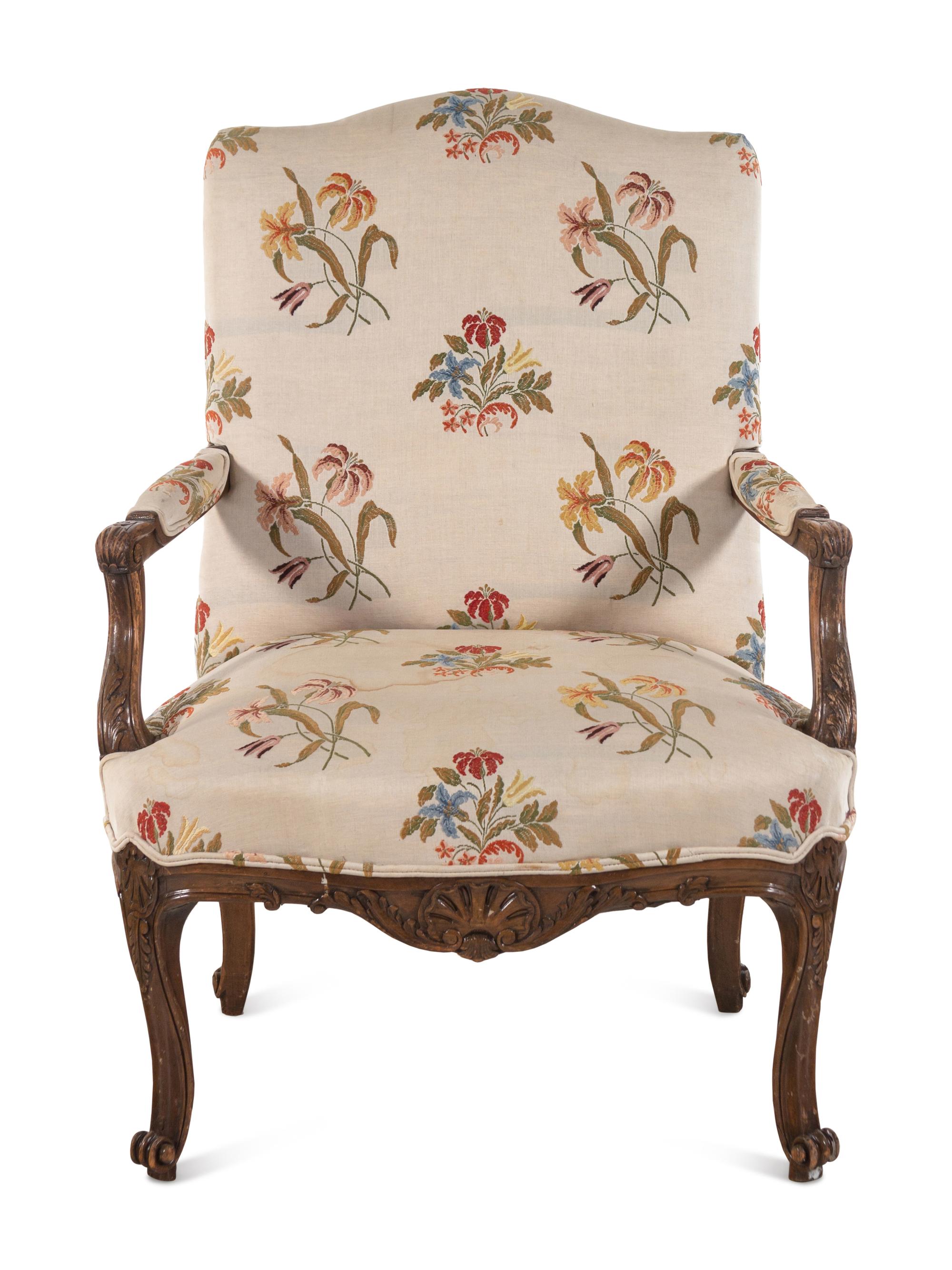 A Régence Style Carved Walnut Armchair