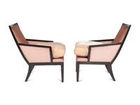 A Pair of Ebonised Bergères