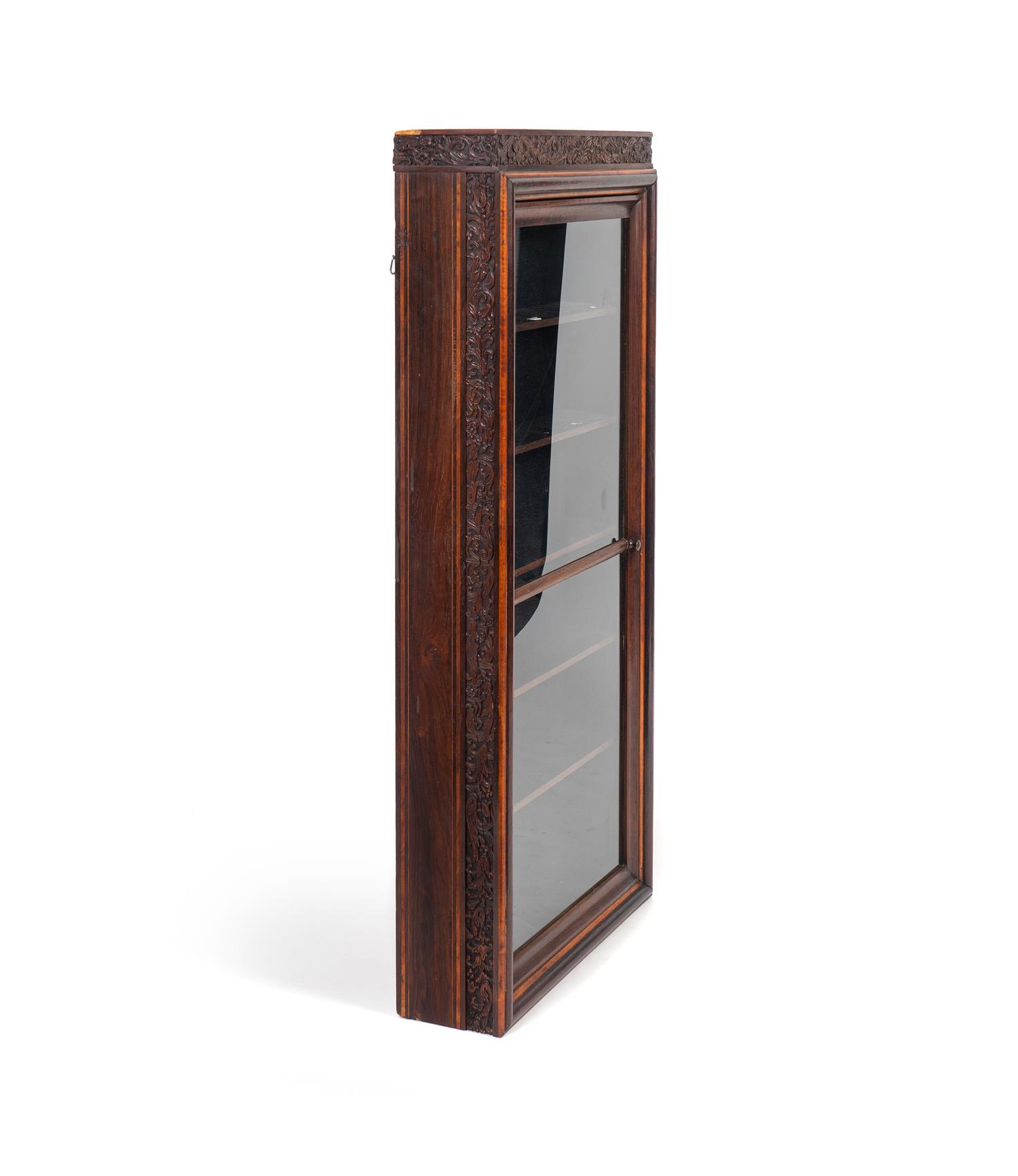 A Chinese Carved Rosewood Hanging Cabinet — 19TH CENTURY