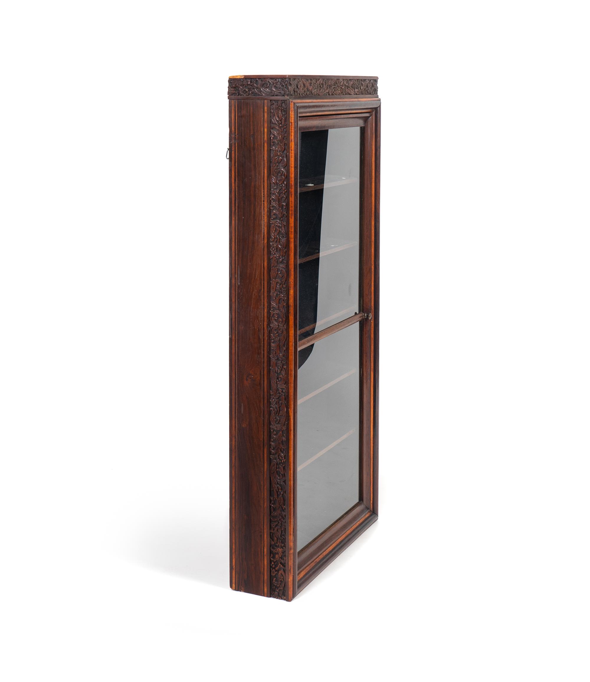 A Chinese Carved Rosewood Hanging Cabinet — 19TH CENTURY