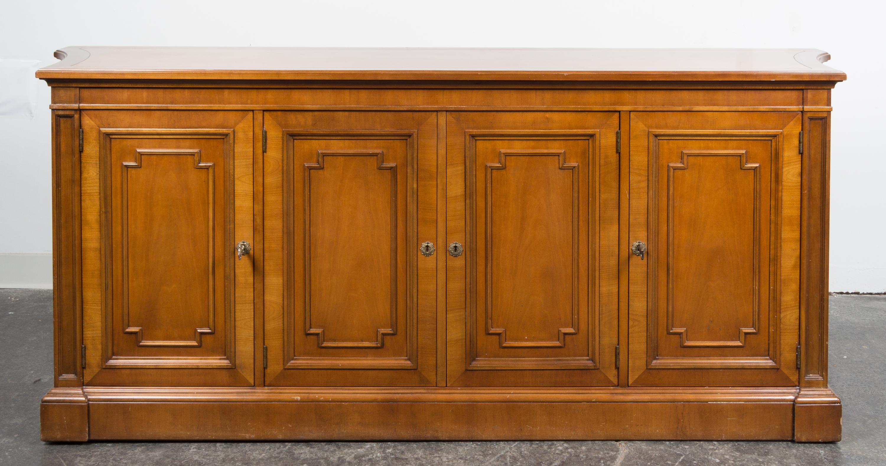 A Kindel Fruitwood Sideboard Height 31 1/4 x width 74 1/4 x depth 18 1/2 inches.