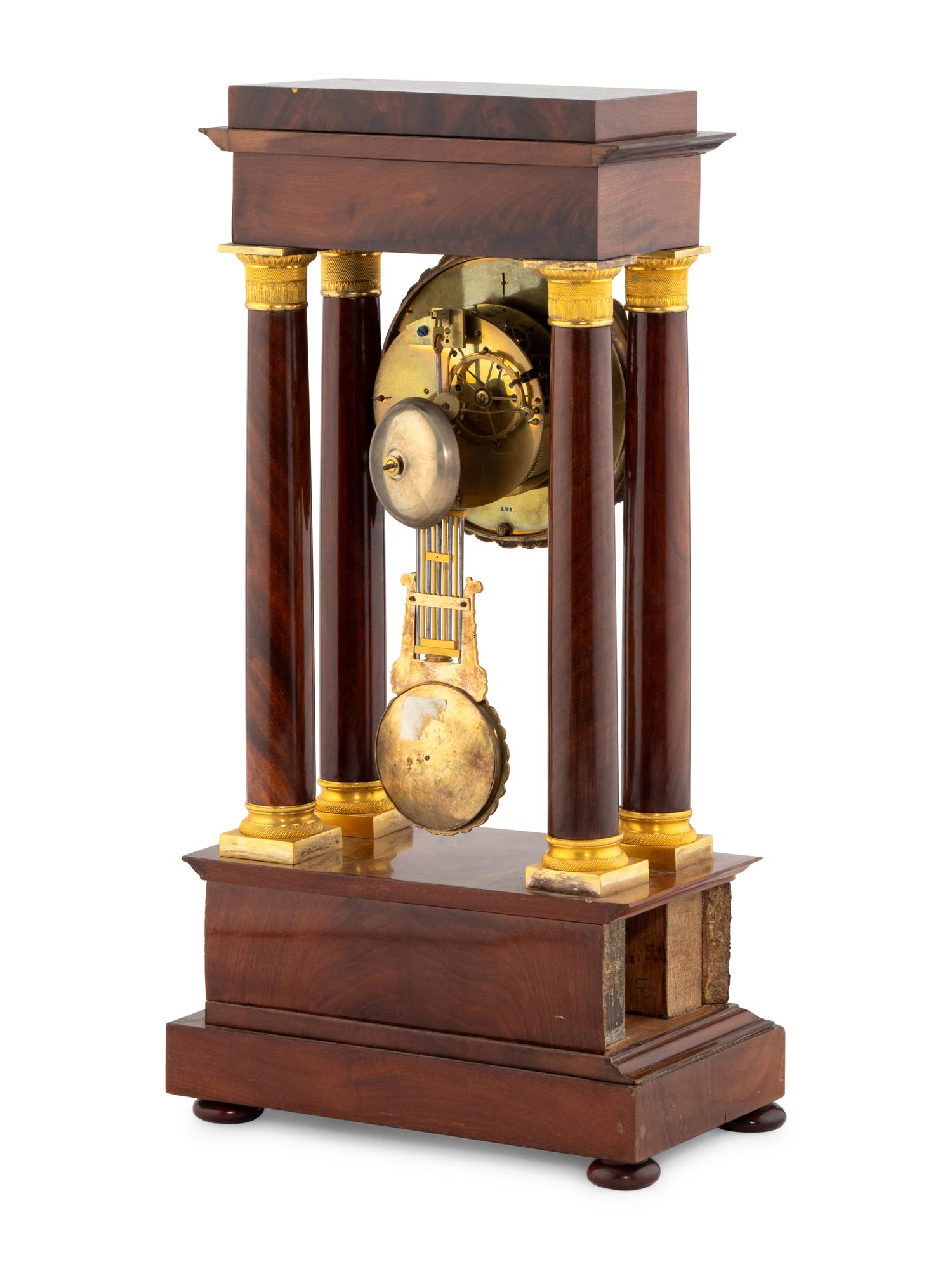 A Charles X Gilt-Bronze Mounted Portico Clock