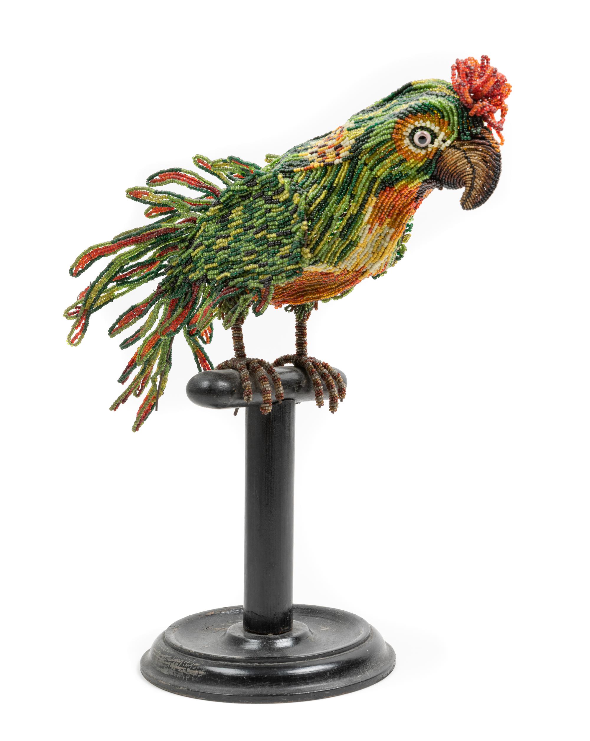 An English Beadwork Figure of a Perched Parrot Height 14 x width 13 inches. — 19TH CENTURY