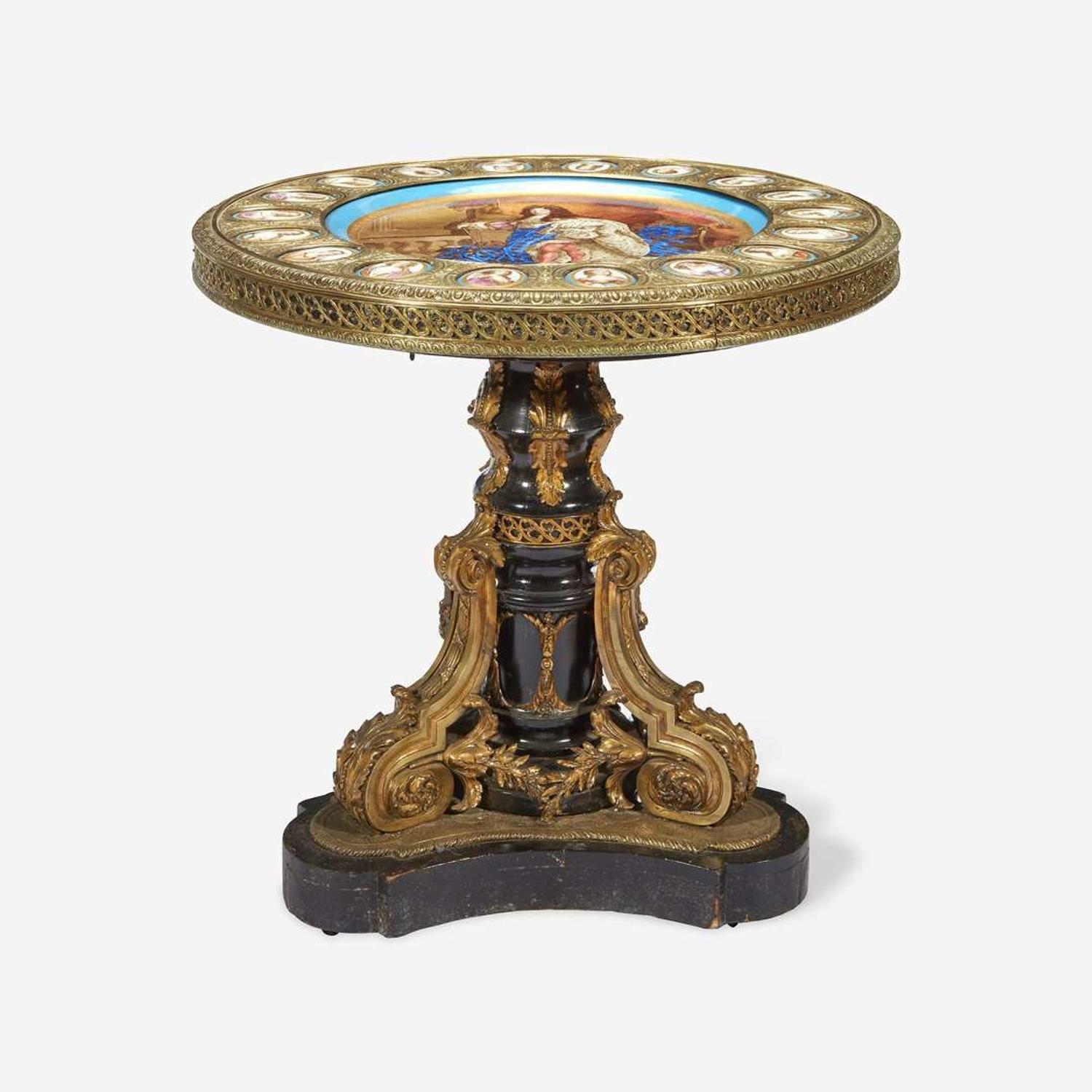 A Sèvres Style Porcelain Mounted Ebonized and Gilt-Bronze Gueridon Table Circa 1880