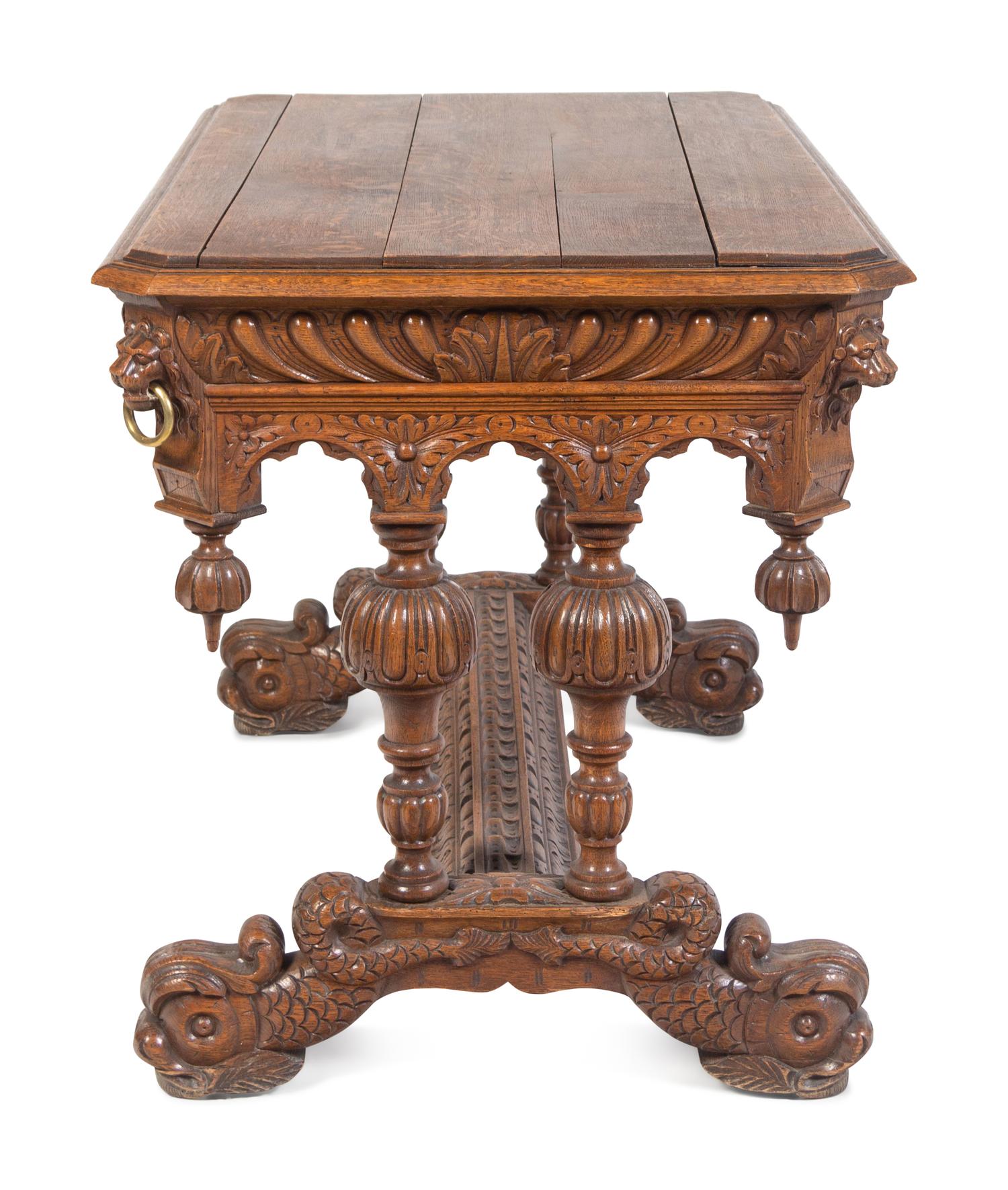 A Renaissance Revival Carved Oak Library Table in the Style of R.J. Horner